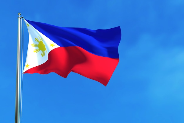 青い空の背景にフィリピンの国旗