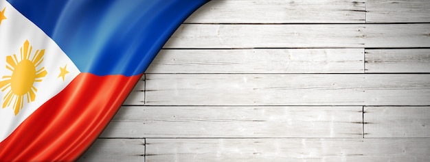 Philippines flag on old white background. Horizontal panoramic .