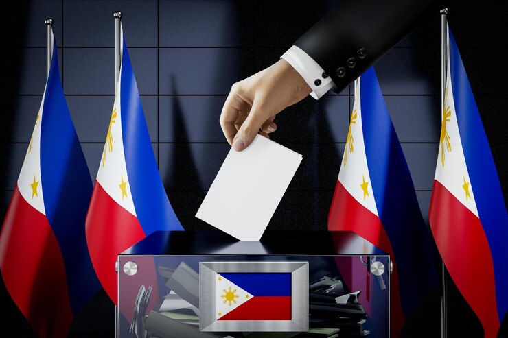 Photo philippines flags hand dropping ballot card into a box voting election concept 3d illustration