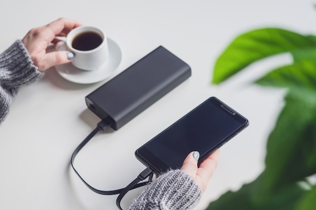 Phone charged using a portable charger