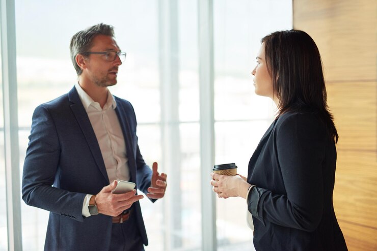 Photo phone investor or businesswoman in office for meeting conversation or collaboration for funding ideas teamwork talking or financial manager planning for growth feedback report or project review
