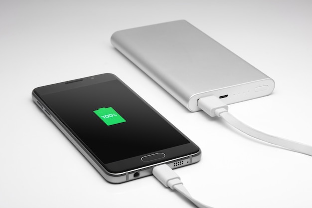 The phone is charging. Fully charge. Smartphone.