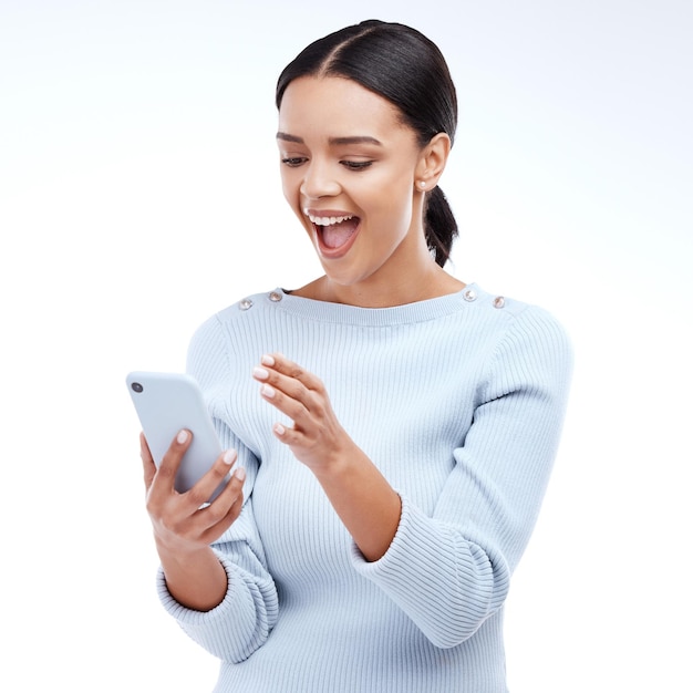 Phone news surprise reading and happy woman shocked over mobile notification app promotion and wow discount OMG giveaway info cellphone announcement and excited studio person on white background