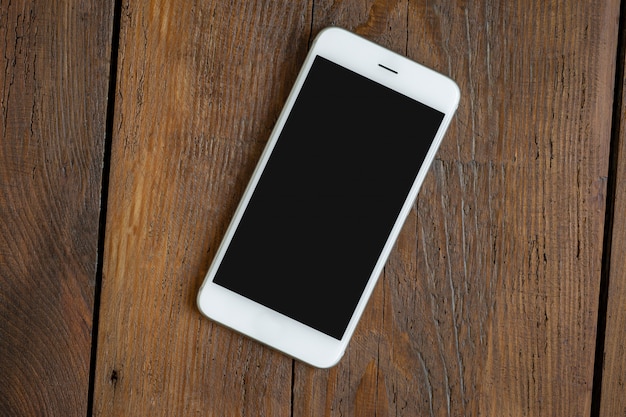 Phone on wooden table