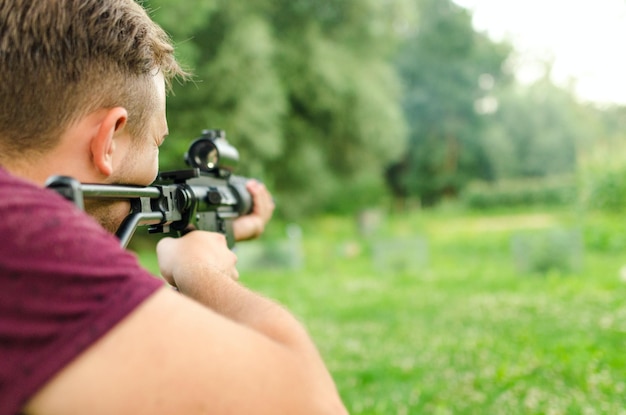 Photo of action aiming airsoft