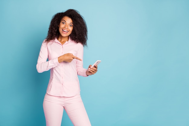 Photo of amazing lady holding telephone direct finger