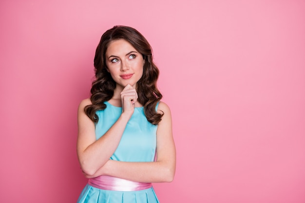 Photo of attractive curly charming lady arm on chin look interested up side empty space