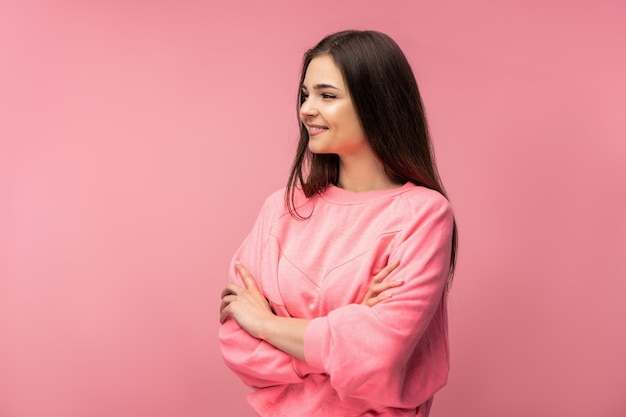 Photo of attractive young woman smile cross hands