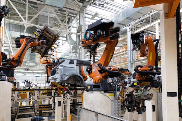 Photo of automobile production line modern car assembly plant auto industry interior of a hightech