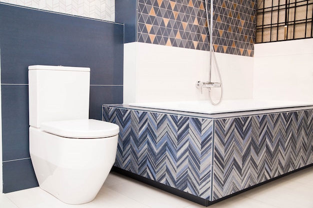 Photo of bathroom and blue ceramic tiles