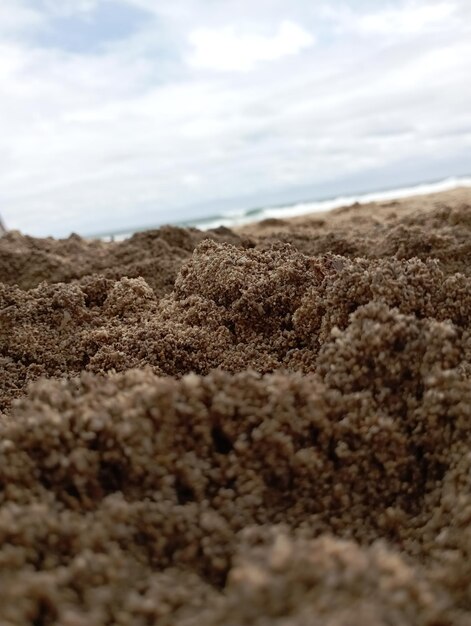 photo of beach sand and sky