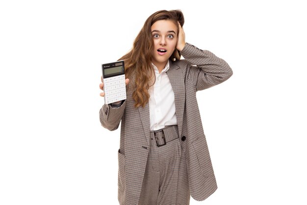 Photo of beautiful cute pretty surprised shocked brunette teenage girl with long hair in stylish