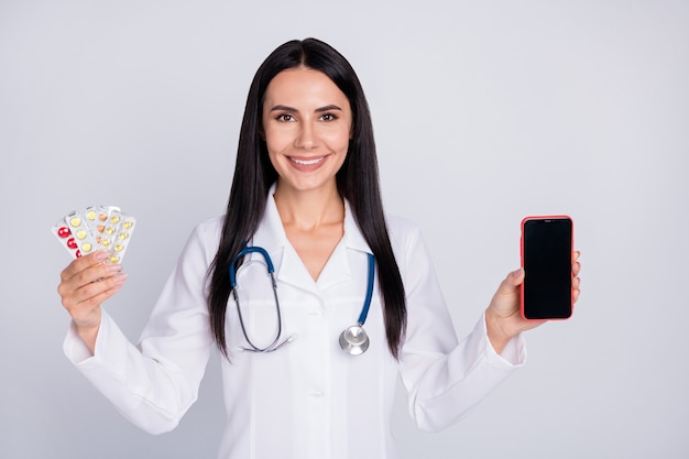 Photo of beautiful doc lady proposing several variants pills