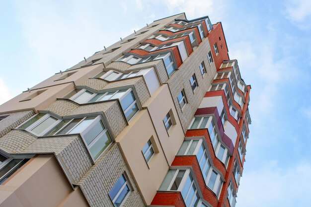 Photo of beautiful red white modern apartment building