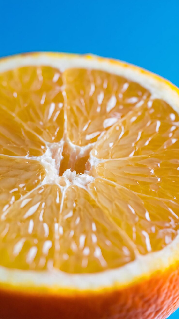 A photo of a beautifully detailed half of an orange