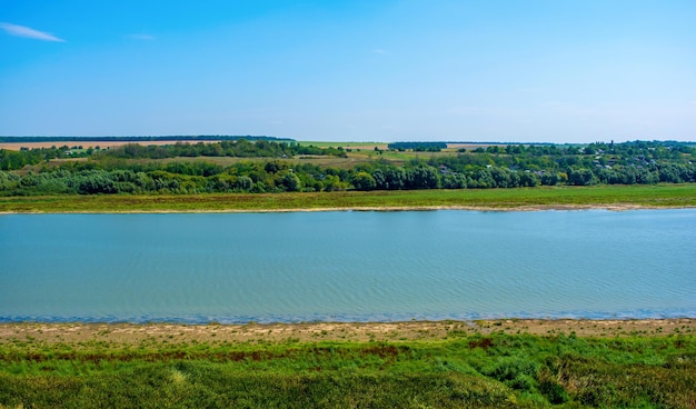 Photo of big river in Khotyn view from beach