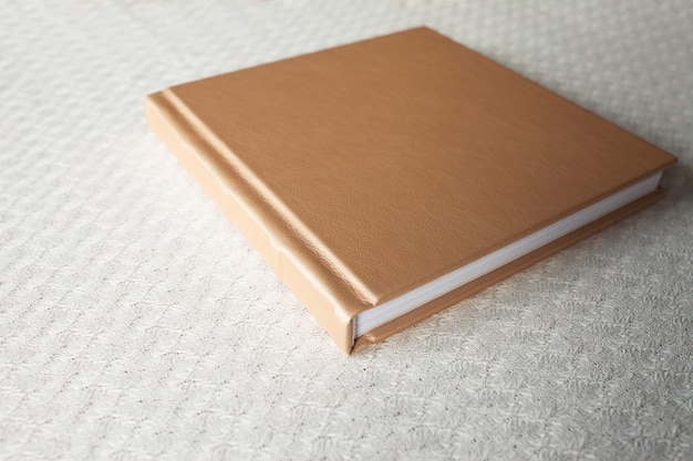 Photo book with leather cover Stylish wedding or family photo album Beautiful notepad or photobook with elegant embossing Printing products Individual products Details