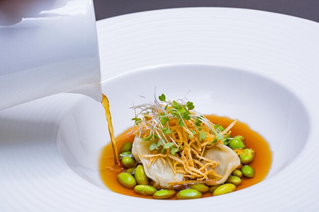 Photo of a bowl with an orange soup