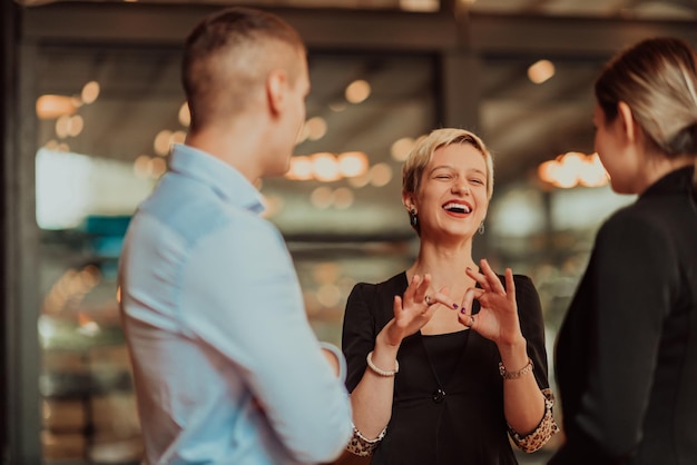 Photo of a business team of young people discussing business ideas in a modern urban environment Selective focus