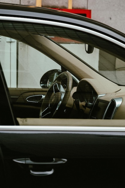 Photo of a Car with a Beige Steering Wheel Stock Photo