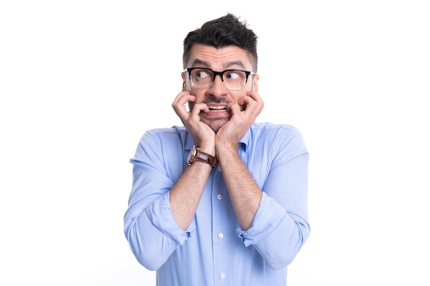 Photo of caucasian scared man in panic scared man in panic isolated on white background scared man in panic in studio scared man in panic feel fear