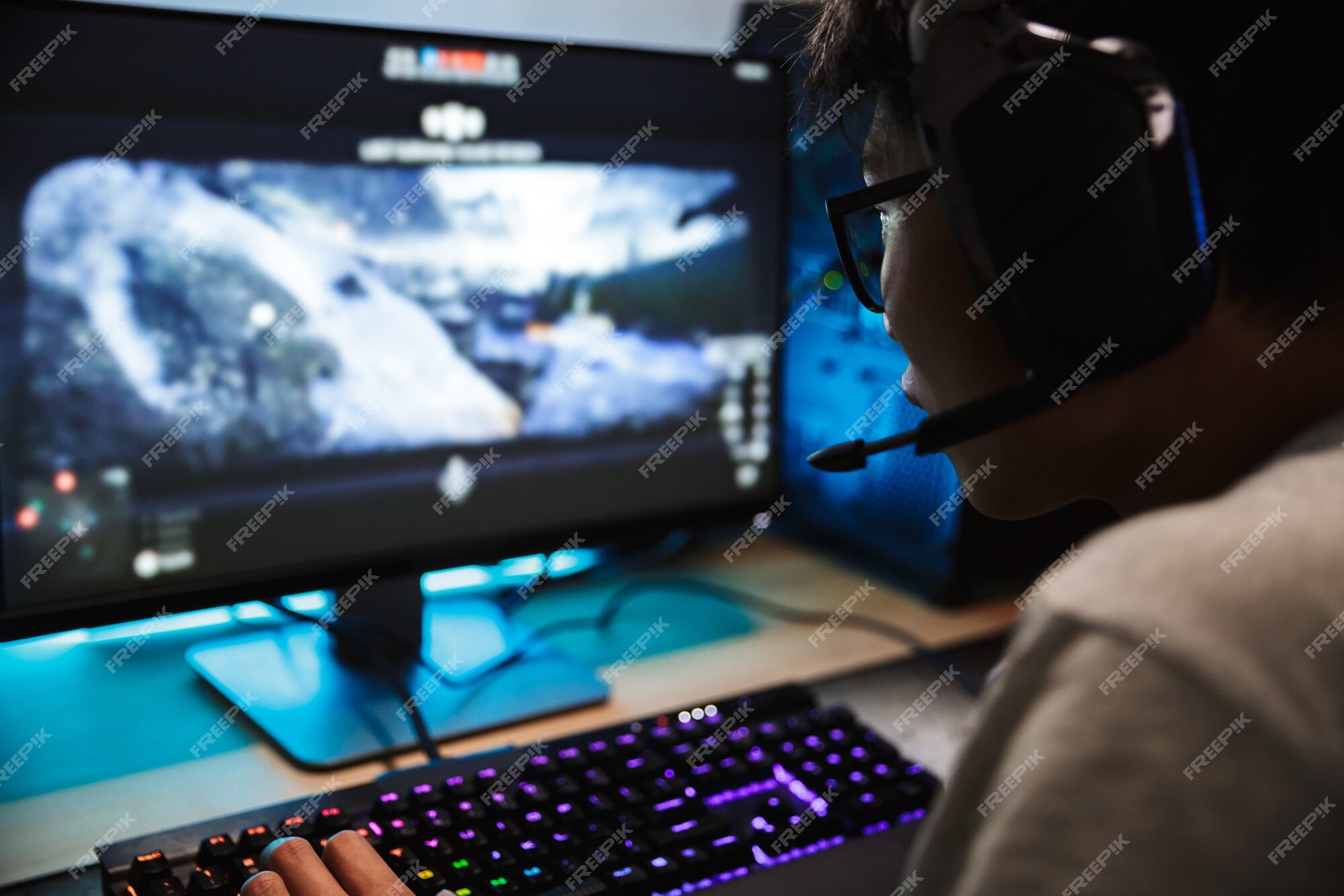 Premium Photo  Gamer playing online game on pc in dark room.