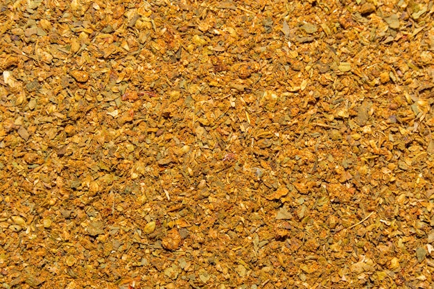 Photo of closeup texture of beautiful orange hot spice for meat and chicken background