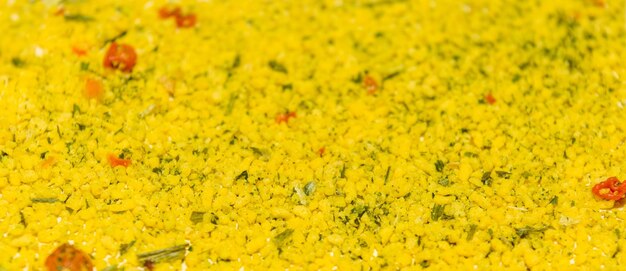 Photo of closeup texture of universal yellow spice for different food background