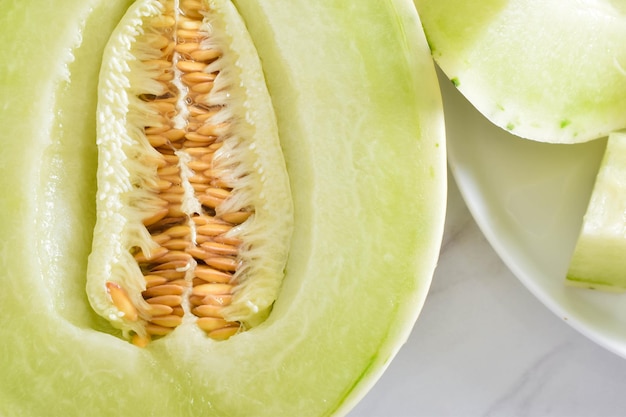 Photo of detailed fresh cutted melon with seeds