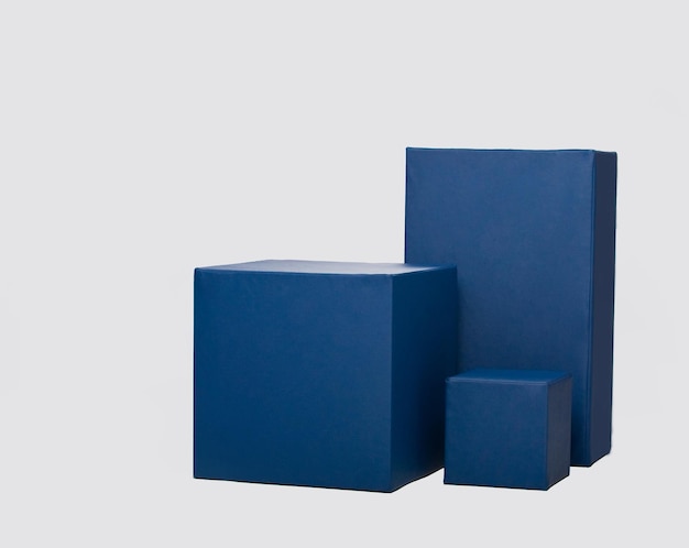 photo of different rectangular blue cubes on a white background