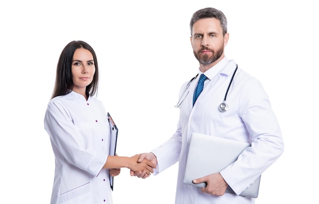 Photo of doctor handshaking internist wear white coat internist and doctor with laptop