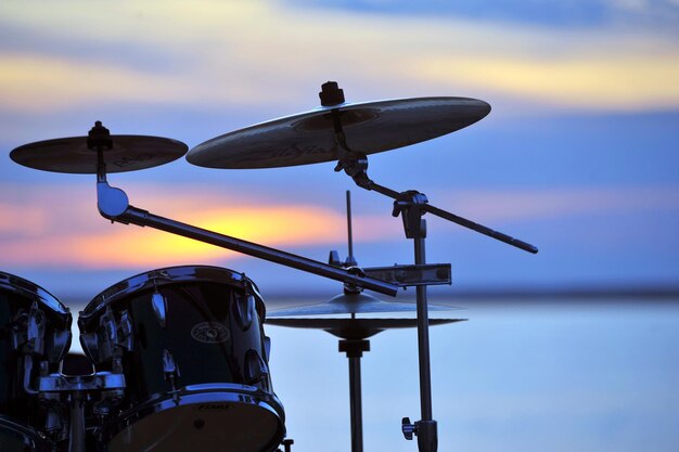 Photo drum set against a beautiful sunset