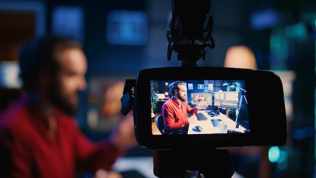 Photo editor presenting photography internet guide to audience