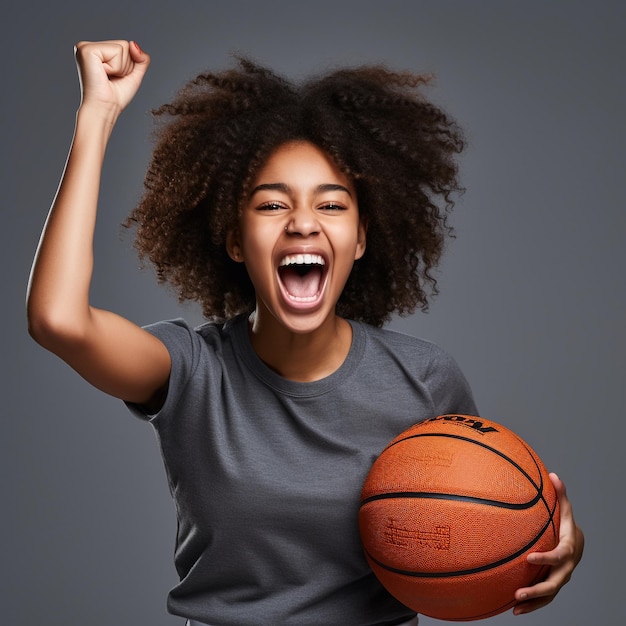 photo of exited black girl holding a ball
