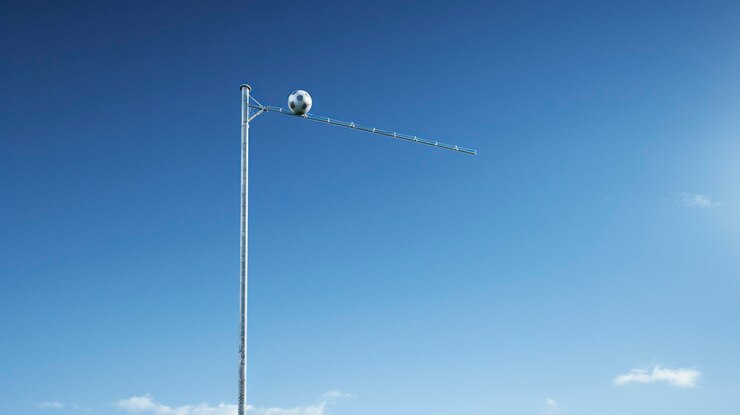 A photo of a football goalpost against a clear sky
