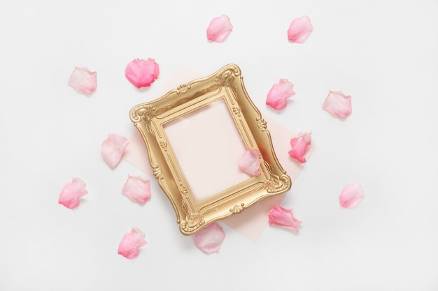 Photo photo frame decorated  with rose petals