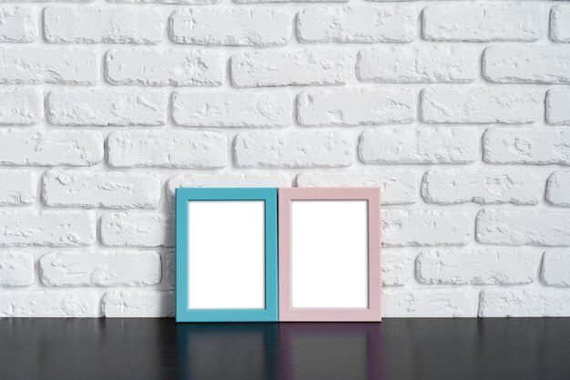 Photo frame with copy space against white brick wall