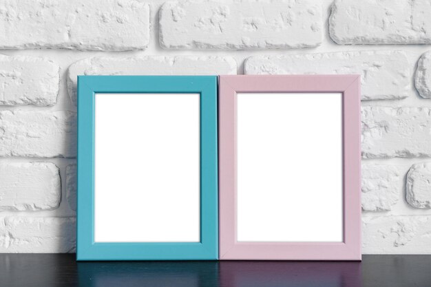 Photo photo frame with copy space against white brick wall