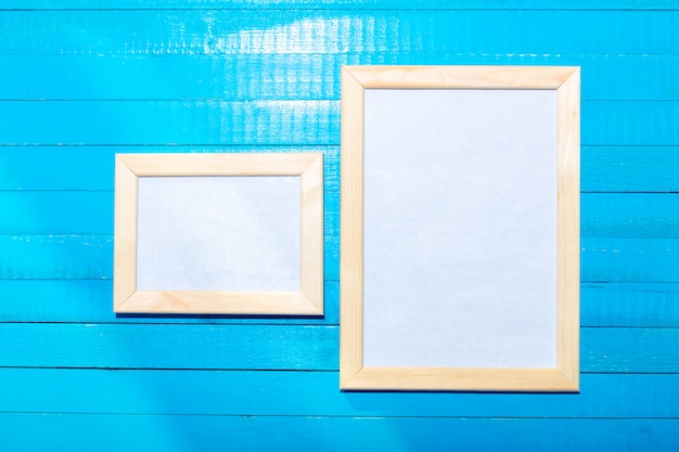  photo frames on the wooden wall