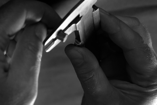 Photo hands of the men working at the moment