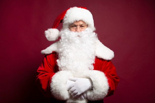 Photo of happy smiling Santa Claus is posing 