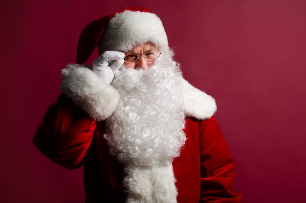 Photo of happy smiling Santa Claus is posing 