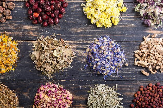 Photo of herbs on wooden background Nature medicine