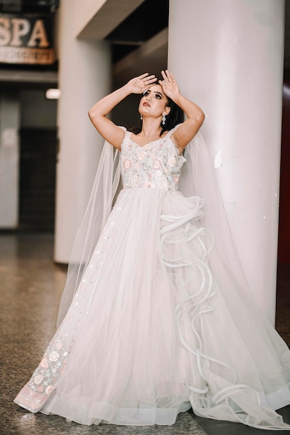 Beautiful Indian Woman In White Wedding Dress. Professional Makeup  Hairstyle Bride Stock Photo, Picture and Royalty Free Image. Image 29449373.