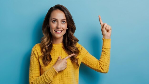 Photo of interested happy woman looks and points at upper right corner feels awesome