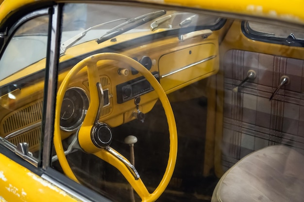 Photo of the interior of an old car