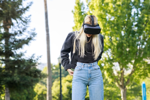 A photo of the lady wearing VR glasses and looking down