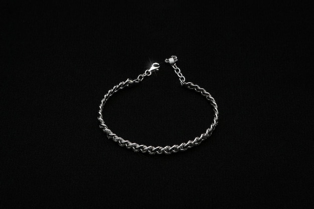 Photo photo of luxury white gold diamond hand bracelet black background