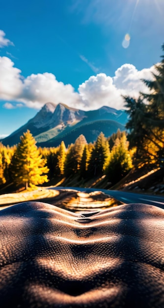 photo of a mountain and blue sky with clouds forest photography