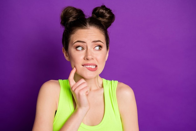 Photo of nervous girl touch finger cheek cheekbones wear tank-top isolated over bright color background